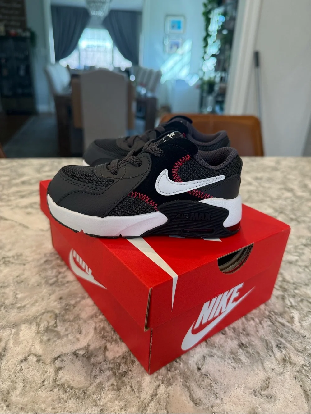 Nike Kids Black/White Sneakers with Red Stitch Accents